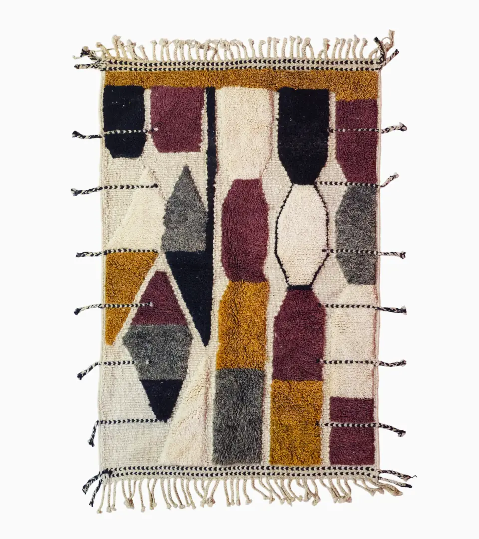 Top View of Imani handmade Beni Ourain wool rug with a boho geometric high-low design in multicolor hues including plum, yellow, black, and gray