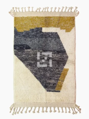 Top View of Imani handmade Beni Ourain wool rug with an abstract geometric design in charcoal gray, mustard yellow, and ivory