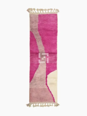Top View of Kami handmade Beni Ourain wool runner with a pink abstract design in fuchsia and ivory