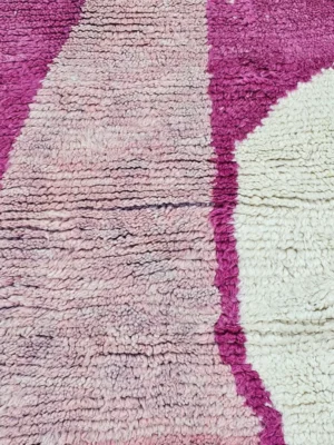 Detailed View of Kami handmade Beni Ourain wool runner with a pink abstract design in fuchsia and ivory