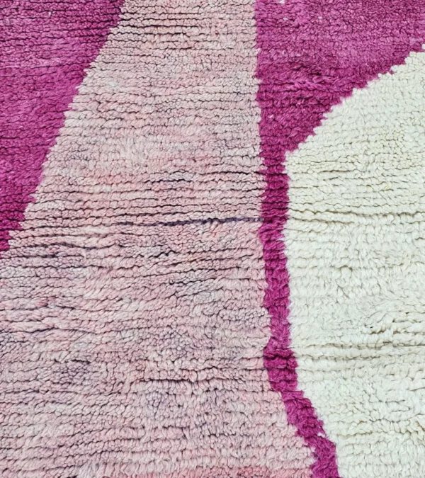 Detailed View of Kami handmade Beni Ourain wool runner with a pink abstract design in fuchsia and ivory