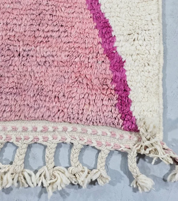 Detailed View of Kami handmade Beni Ourain wool runner with a pink abstract design in fuchsia and ivory