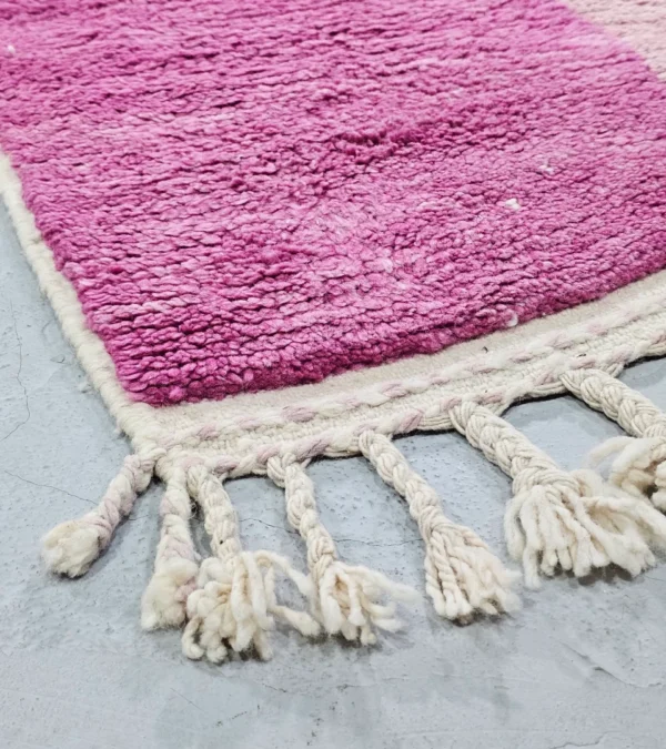 Detailed View of Kami handmade Beni Ourain wool runner with a pink abstract design in fuchsia and ivory