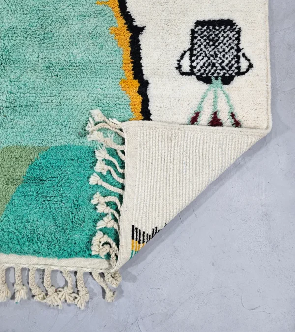 Detailed View of Moroccan Azilal wool rug with symbolic color-rich design from the Kezrah Tapestry Flow series