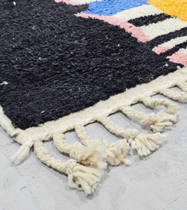 Detailed View of Moroccan Azilal wool rug with symbolic color-rich design from the Kezrah Tapestry Flow series
