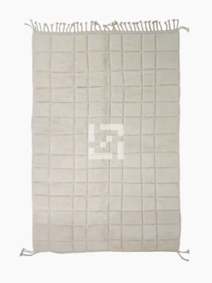 Top View of Lara handmade Beni Mrirt wool rug with a minimalist grid pattern in ivory created with a high/low pile