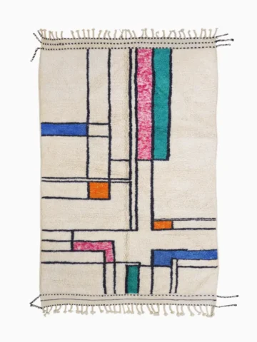 Top View of Lina handmade Beni Ourain wool rug with a geometric lined design in black, ivory, blue, pink, orange, and teal