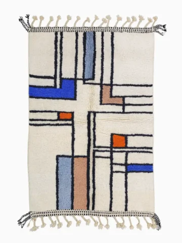 Top View of Lina handmade Beni Ourain wool rug with a modern abstract geometric design in blue, brown, and orange