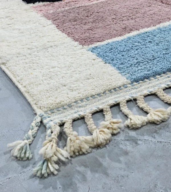 Detailed View of Handmade Moroccan wool rug with abstract multicolor geometric shapes