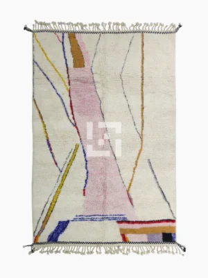 Top View of Handmade Moroccan Azilal wool rug with unique abstract pink, yellow, blue, and brown lines and shapes on an ivory background