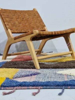 Colorful Handmade Moroccan wool rug with a modern abstract design and a high-low pile in room