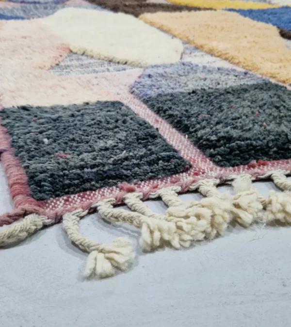 Detailed View of Handmade Moroccan wool rug with a modern abstract design and a high-low pile