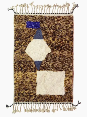 Top View of Luna handmade Beni Ourain wool rug with a boho brown background and a geometric pattern in ivory and blue