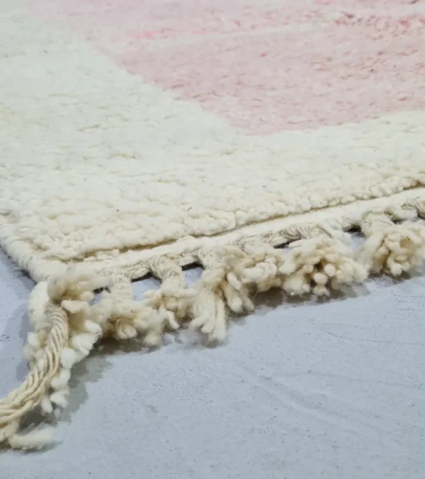 Detailed View of Handmade Moroccan wool rug with an abstract colorblock design in pink, yellow, and black