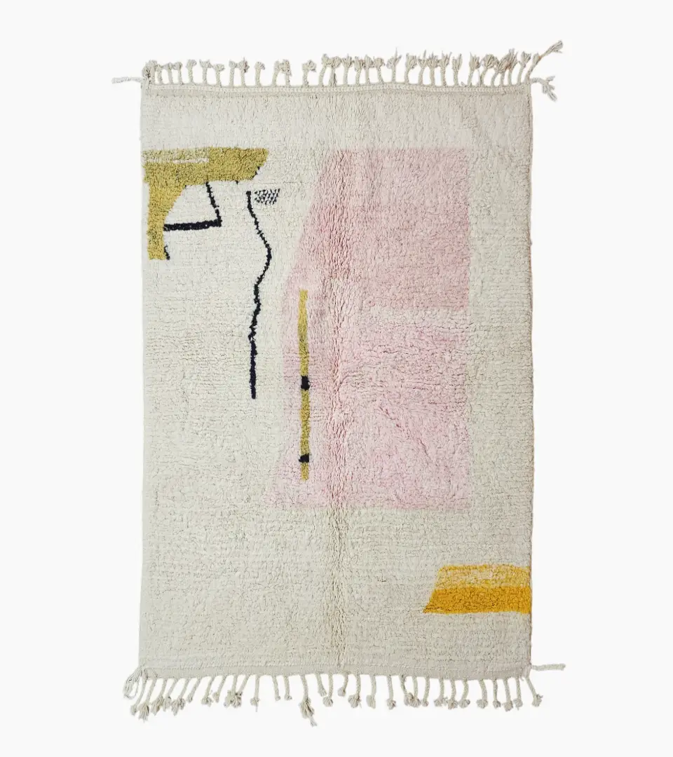 Top View of Handmade Moroccan wool rug with an abstract colorblock design in pink, yellow, and black