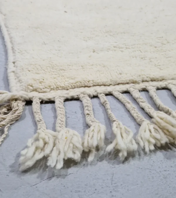 Detailed View of Handmade Beni Ourain wool runner with a minimalist lattice design created by high-low pile in ivory