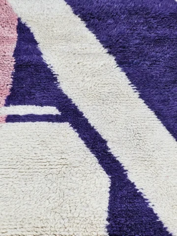 Detailed View of Nadia handmade Beni Ourain wool runner rug with an abstract color block design in pink and purple