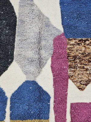 Detailed View of Nayla handmade Beni Ourain wool rug with an abstract geometric design in a multicolor palette