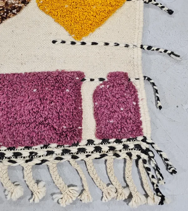 Detailed View of Nayla handmade Beni Ourain wool rug with an abstract geometric design in a multicolor palette