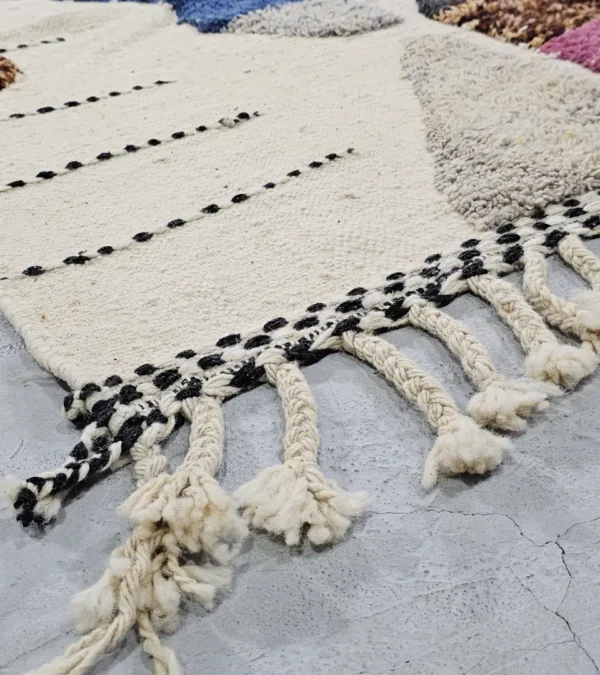Detailed View of Nayla handmade Beni Ourain wool rug with an abstract geometric design in a multicolor palette