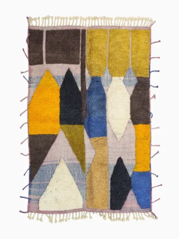 Top View of Nayla handmade Beni Ourain wool rug with a colorful geometric design and tassels