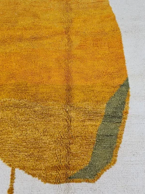 Detailed View of Neo handmade Beni Ourain wool rug with a bold abstract design in mustard yellow and olive green