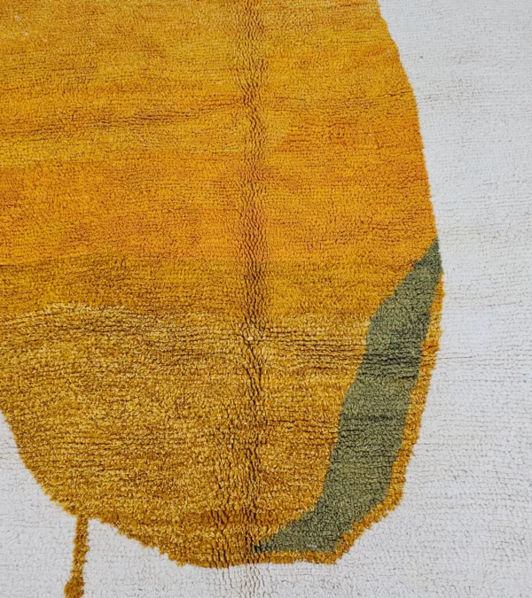 Detailed View of Neo handmade Beni Ourain wool rug with a bold abstract design in mustard yellow and olive green