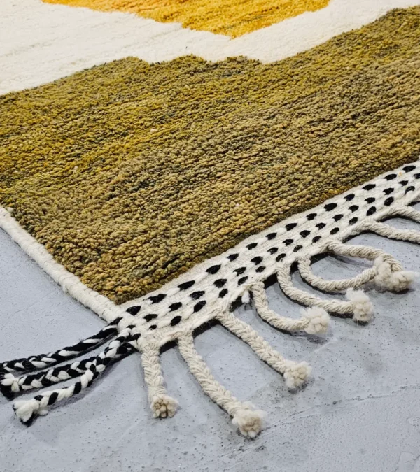 Detailed View of Neo handmade Beni Ourain wool rug with a bold abstract design in mustard yellow and olive green
