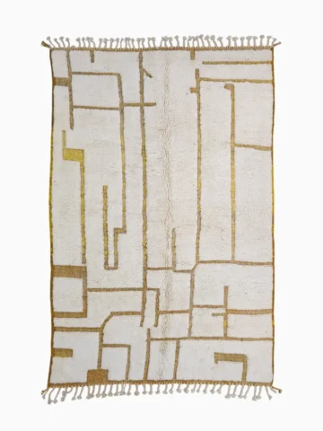 Top View of Noor handmade Beni Ourain wool rug with a minimalist labyrinth geometric pattern in yellow and ivory