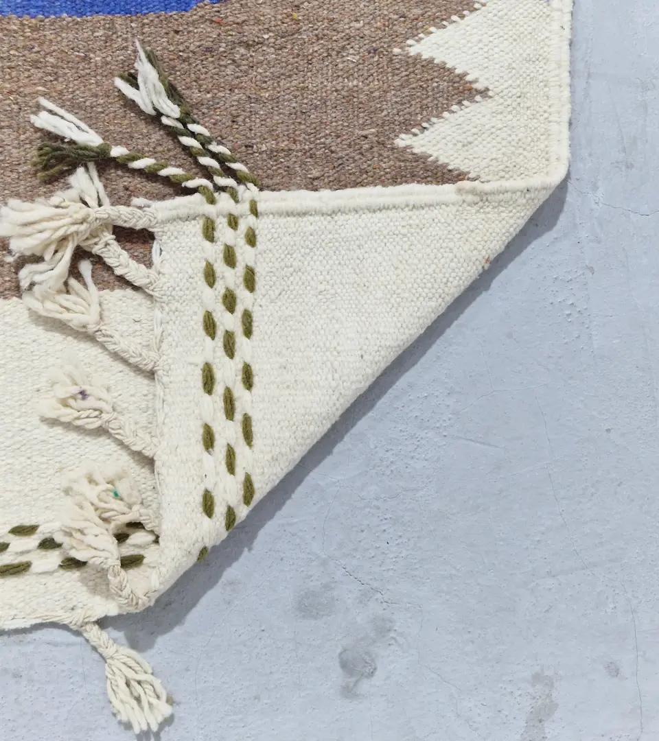 Detailed View of Nora handmade Kilim wool runner rug with colorful jagged vertical stripes