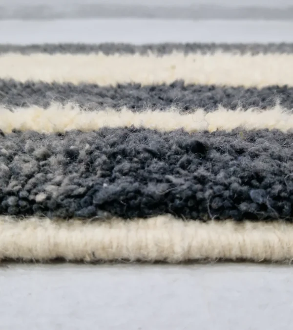Zoomed In View of Nova handmade Beni Ourain wool runner with an abstract striped design in gray and ivory