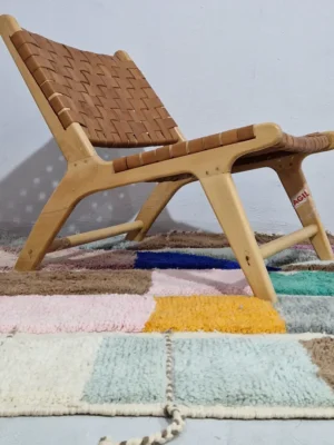 Nyla handmade Beni Ourain wool rug with a contemporary high-low geometric pattern in multicolor hues in room