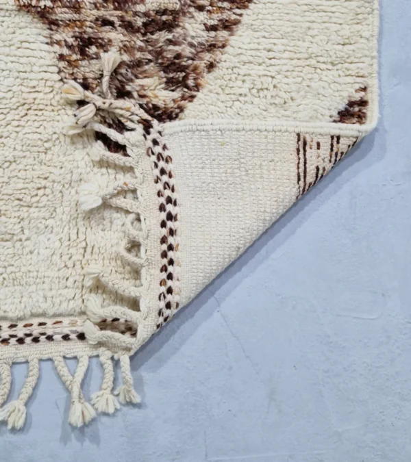 Detailed View of Orin handmade Beni Mrirt wool runner with an abstract diamond design in brown, green, and ivory