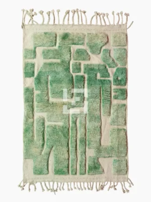 Top View of Ruby handmade Moroccan wool rug with a textured, raised abstract design in green and ivory