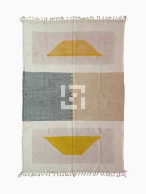 Top View of Sana handmade Kilim flatweave wool rug with color blocks in off-white, teal, and beige, with yellow trapezoids