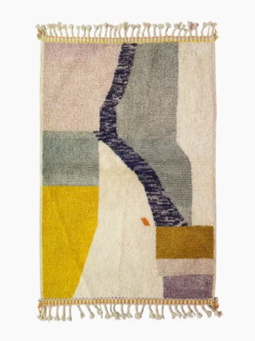Top View of Sanaa handmade Beni Ourain wool rug with a contemporary abstract design in multicolor hues including lavender, grayish-green, mustard yellow, dark teal, and golden brown