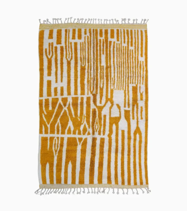Top View of Sara handmade Beni Ourain wool rug with a modern striped and abstract design in yellow and ivory