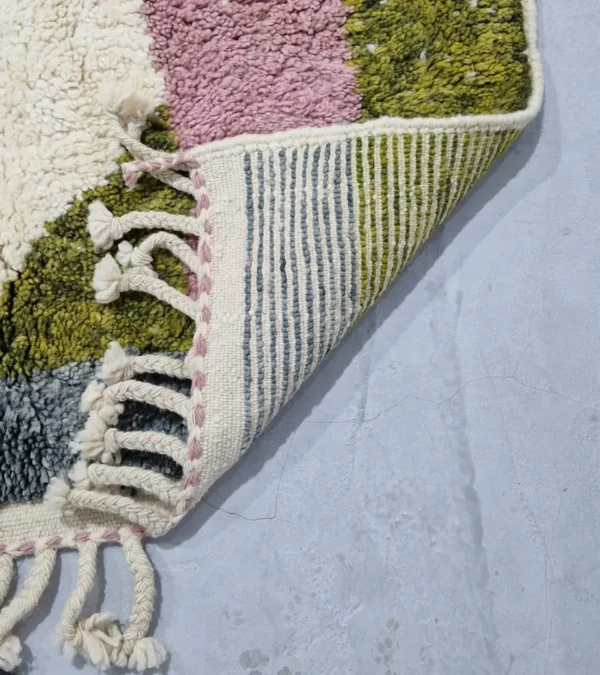 Detailed View of Sary handmade Moroccan wool rug with an abstract boho design in earthy colors