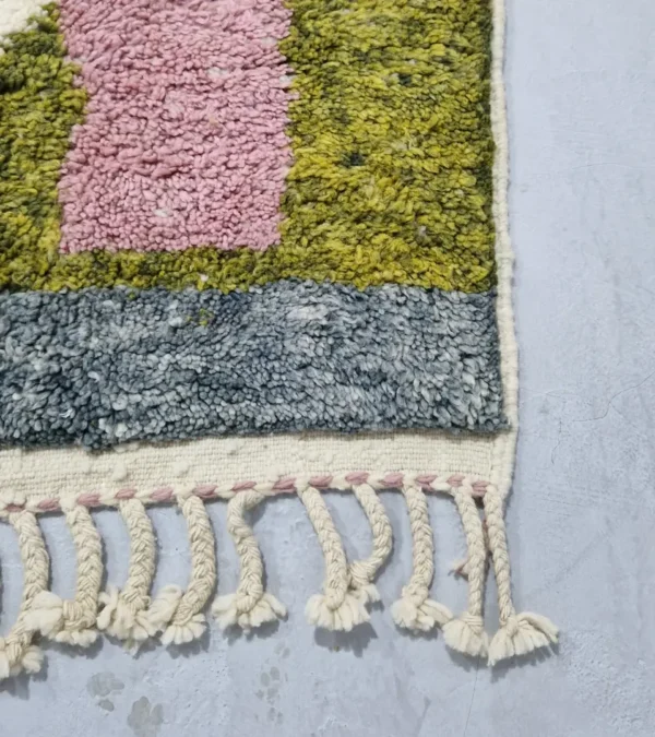 Detailed View of Sary handmade Moroccan wool rug with an abstract boho design in earthy colors