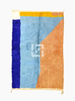 Top View of Handmade Moroccan wool rug with a geometric color-block design in blue, orange, and yellow