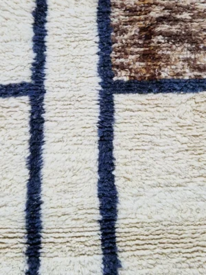 Detailed View of Solara handmade Beni Mrirt wool runner with a modern geometric design in brown, dusty blue, and ivory