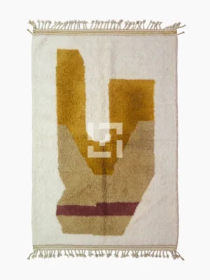 Top View of Soma handmade Beni Ourain wool rug with a modern abstract design featuring blocks of yellow, beige, and maroon