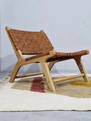 Soma handmade Beni Ourain wool rug with a modern abstract design featuring blocks of yellow, beige, and maroon in room