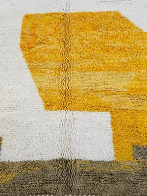 Detailed View of Soma handmade Beni Ourain wool rug with abstract color blocks in mustard yellow and brown