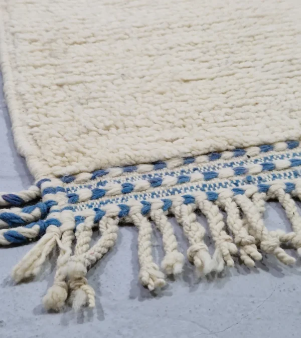 Detailed View of Soraya handmade Azilal wool runner with an abstract geometric design in pink, yellow, blue, and navy