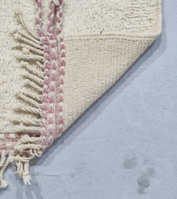 Detailed View of Soraya handmade Azilal wool runner with an abstract geometric design in pink, yellow, blue, and navy