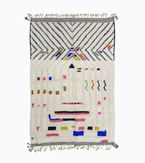 Top View of Suzan handmade Beni Ourain wool rug with a bold chevron and abstract raised maze design in black and multicolor on an ivory background