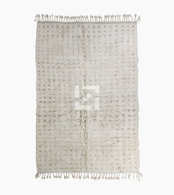 Top View of Handmade Moroccan Beni Ourain wool rug with a minimalist geometric pattern and extra soft shag pile in a natural ivory color