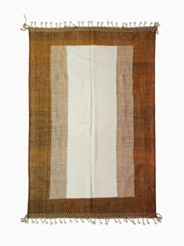 Top View of Taya handmade Kilim flatweave wool rug with a brown striped border and a large white central rectangle