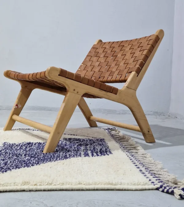 Toda handmade Beni Ourain wool rug with a modern organic abstract design in blue and beige in room